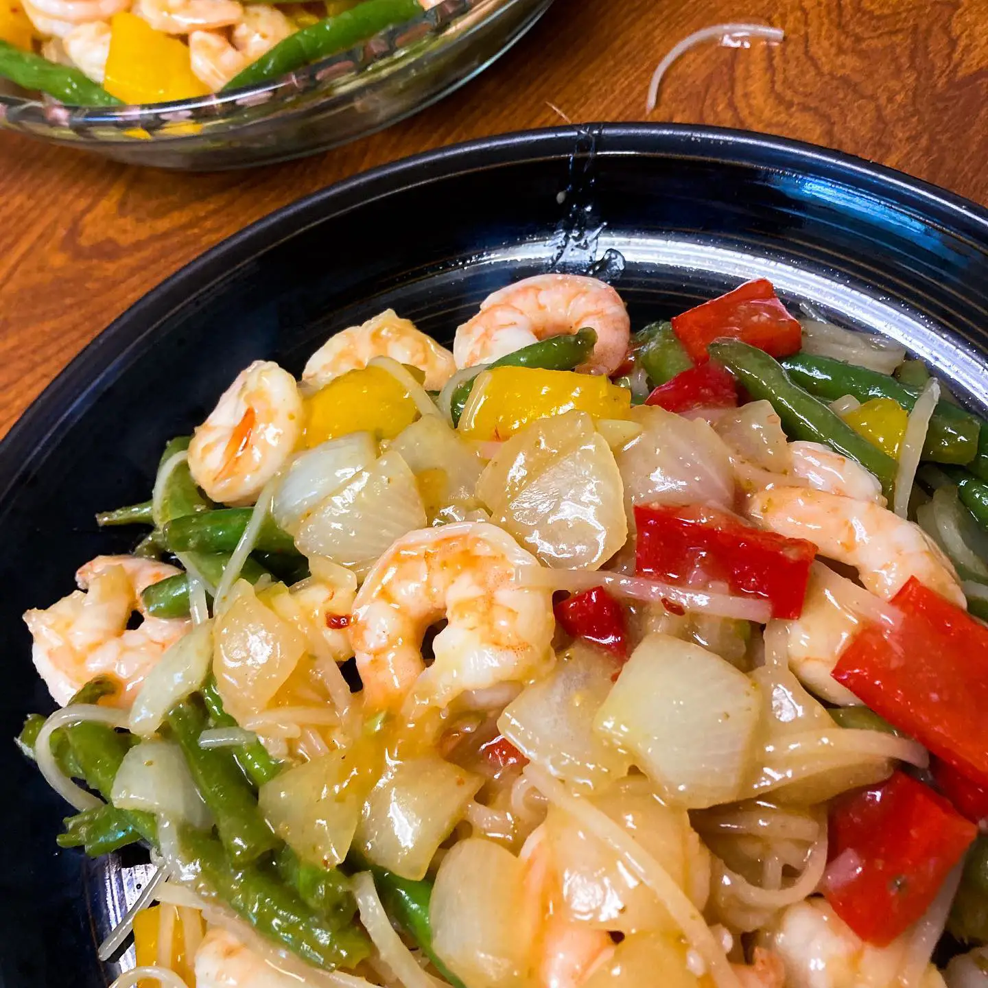 There is something about misspelling the word shrimp that makes me unbelievably happy inside—shramp, skrimp, shromp, shrymp—I love them all! . . . This is a shrimp stir fry with rice noodles, green beans, onions, bell peppers, and orange sauce! If you haven’t had a good stir fry lately here’s your sign that it’s time! What are your favorite things to put in a stir fry? . . . . . #stirfry #shrimp #chinesefood #healthyfood #cooking #cookingathome #feedfeed #f52grams #foodblog #foodblogfeed #heresmyfood #onmytable #dailyfoodfeed #thekitchn #foodstagram #eatrealfood #foodphotooftheday #dmvblogger #blackblogger